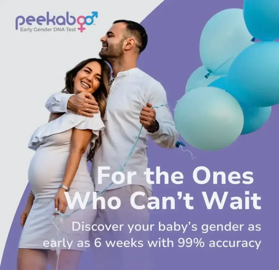 A happy expecting couple holding balloons